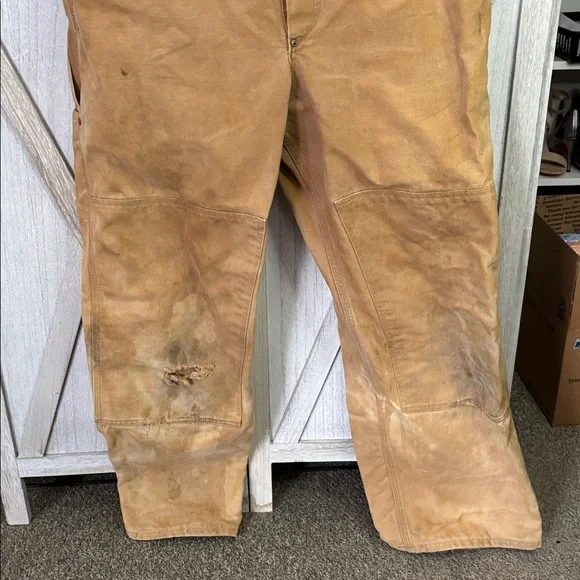 Thrashed vintage 80s or 90s carhartt unlined beige double knee duck overall bibs